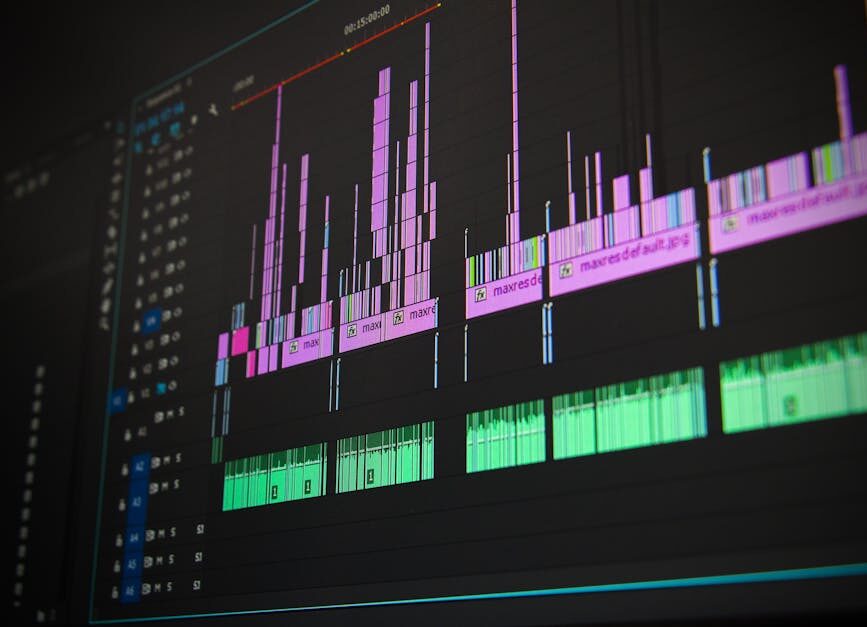Close-up of a professional audio and video editing software interface with waveform displays.